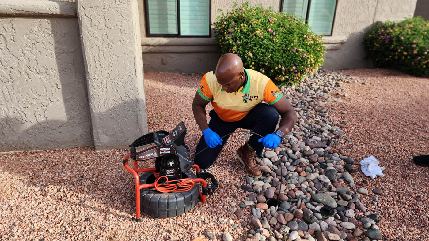 A Zest Plumbing & Drain expert providing sewer line plumbing - an important service that an emergency plumber in Arizona, at Zest Plumbing & Drain can take care of.